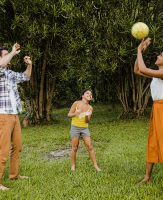 parents-playing-ball-with-daughter-scaled.jpg